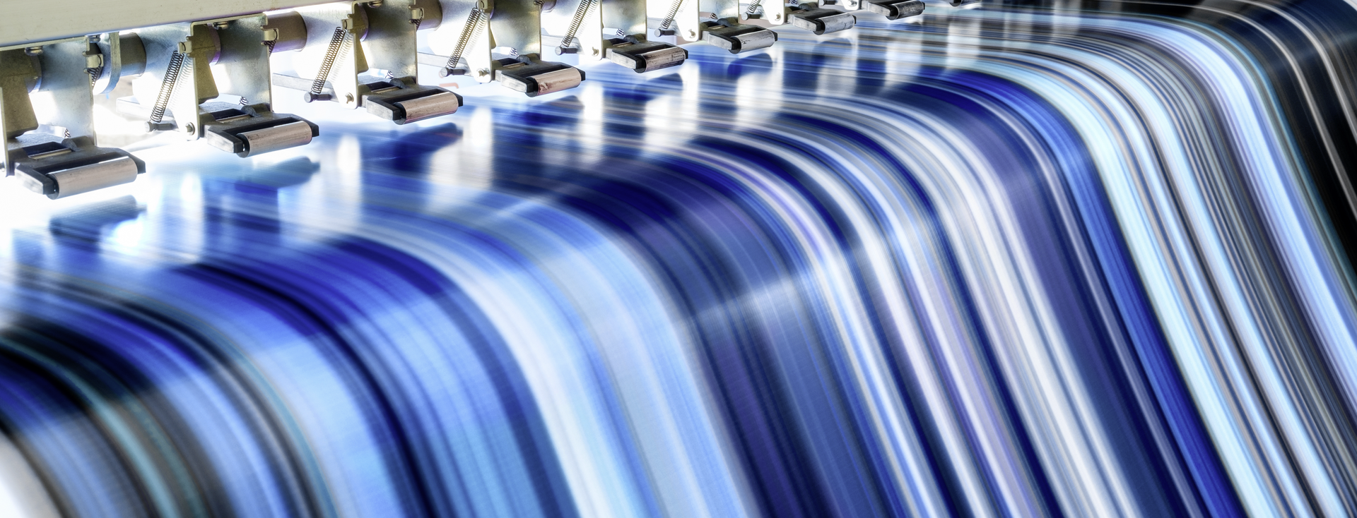 print heads on a large-format digital printing machine produce blue and white colour patterns_2